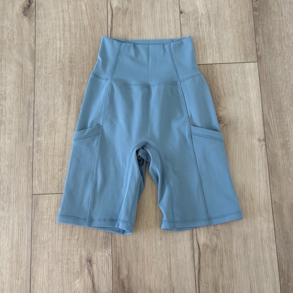 NWT P'Tula Workout Gym Shorts Small Blue Teal 7" Inseam Spandex Pockets